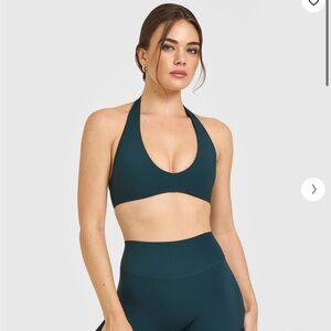 SoftMotion™ Minimal Halter Neck Bralette with White Logo in Oil Blue